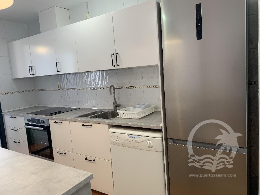 Bajo con jardín de 2 dormitorios y 1 baño en la urbanización Almadraba Playa en Atlanterra - Fotografía inmueble